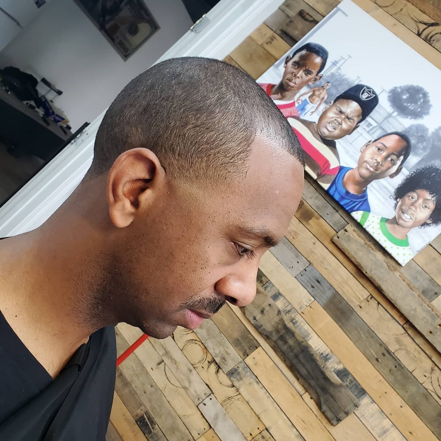 Precision haircut by Kevin at The Lion's Den