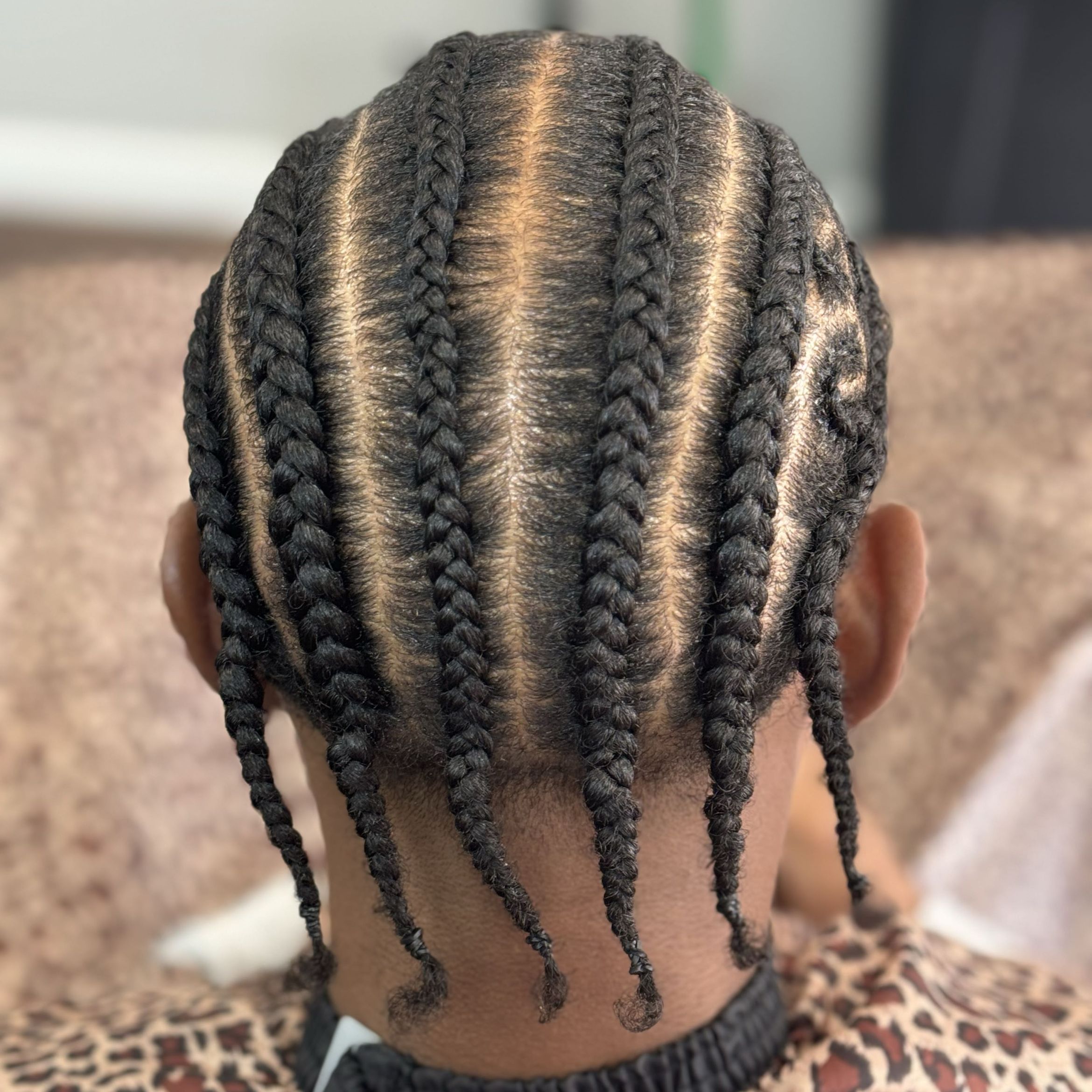 Braiding work by Lioness Braids